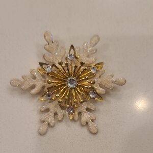 Elegant Gold and Silver Snowflake Brooch